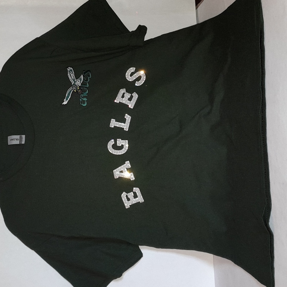 A emerald green Eagles T-shirt